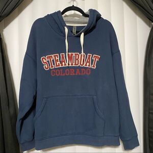 Ouray Sportswear navy blue steamboat Colorado hoodie, front tunnel pockets.
